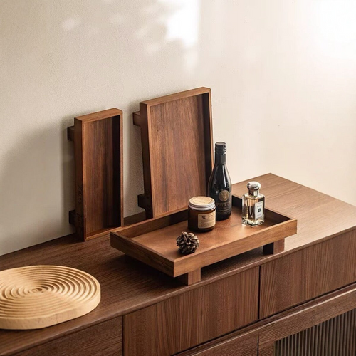 woodnestcraft Japanese style solid wood footed trays in various sizes displayed on a wooden sideboard with decor